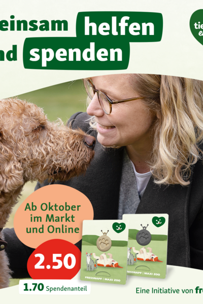 Ein Poster zur Aktion. Darauf ein hellbrauner Hundekopf neben dem Gesicht einer blonden Frau mit Brille und Text zur Aktion.